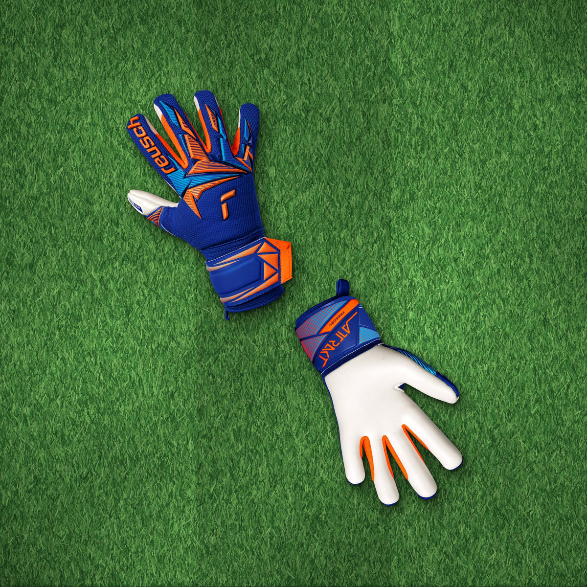 Guantes de arquero Reusch Attrakt Freegel Advance Junior Azul Naranja – foto de ambiente